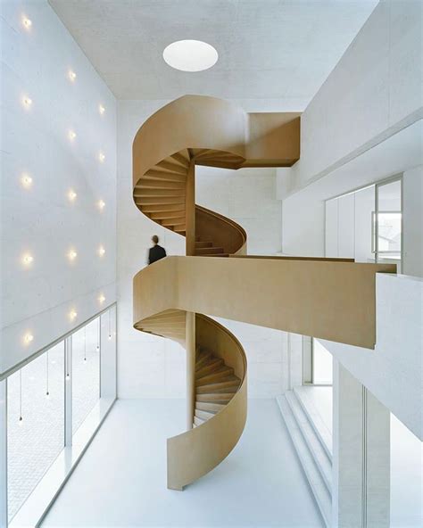 Interior Design Magazine “a Sculptural Spiral Staircase Ascends The