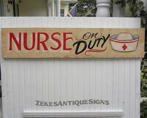 A Sign That Says Nurse On Duty With A Bowl Of Food In Front Of It