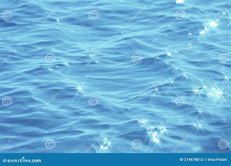 Detail Of A Sunlight Reflecting In Glittering Sea Sparkling In Water