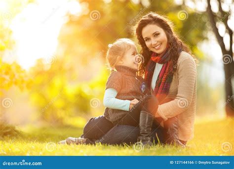 Mother And Daughter Walking In The Autumn Park Beauty Nature Sc Stock