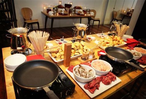 Besides the comfort of gooey cheese and bread or luscious melted chocolate and cake squares there's the silliness of retrieving your lost tidbit in the communal pot. Chef Lea's Fondue Party for 50 | Nesting Newbies | Cooking ...