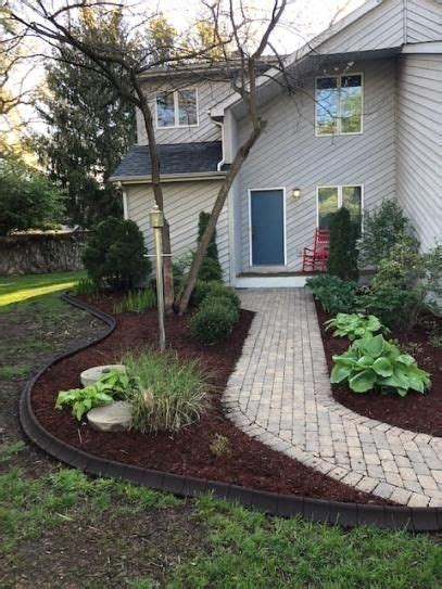 Add to your landscape's appeal by using rubber edging to promote strict contours. EcoBorder 4 ft. Black Rubber Curb Landscape Edging (4-Pack ...