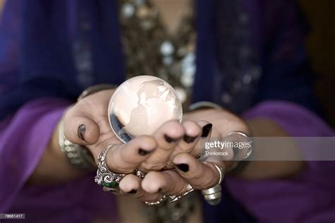 Woman Holding Crystal Ball Bildbanksbilder Getty Images
