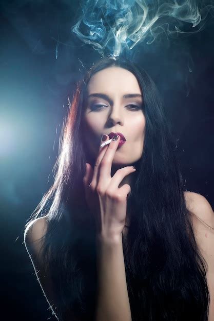 Premium Photo Smoking Pretty Young Woman