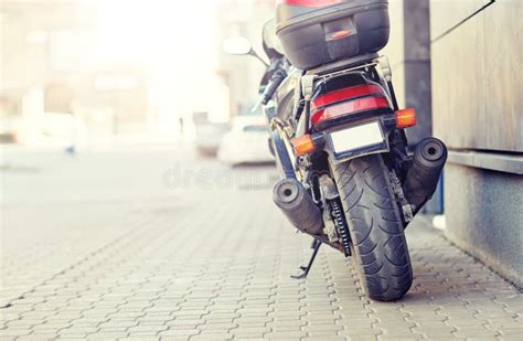 Close Up Of Motorcycle Parked On City Street Stock Photo Image Of