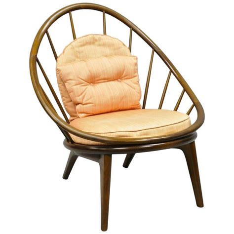 Quintessential danish modern design and comfort, with a discreet side lever that allows the chair to be locked in four positions, from upright to nearly prone. Ib Kofod-Larsen Selig Danish Modern Walnut Peacock Hoop ...