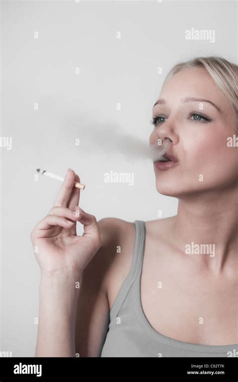 Woman Smoking A Cigarette Stock Photo Alamy