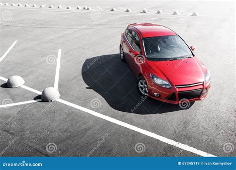 Red Car Stay On Asphalt Parking At Daytime Stock Image Image Of
