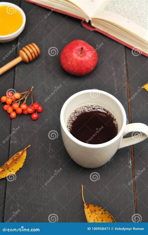 Autumn Still Life Cup Of Tea Honey And Book On The Table Stock Image