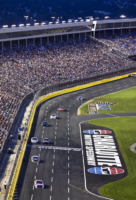 A good part of the light show is synchronized to christmas music (you tune in to. NASCAR - Fans Watch At Charlotte Motor Speedway Editorial ...