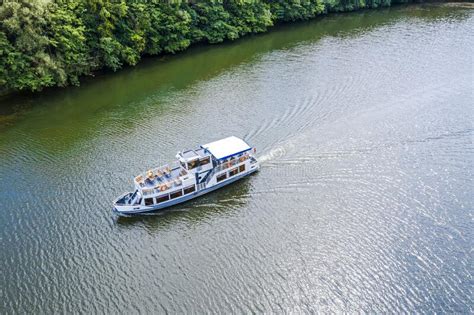 Aerial View Of A Small Pleasure Boat Cruising On The River Stock Image