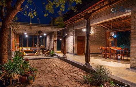 Earthy Farmhouse Design Weaved Around A Traditional Courtyard Studio