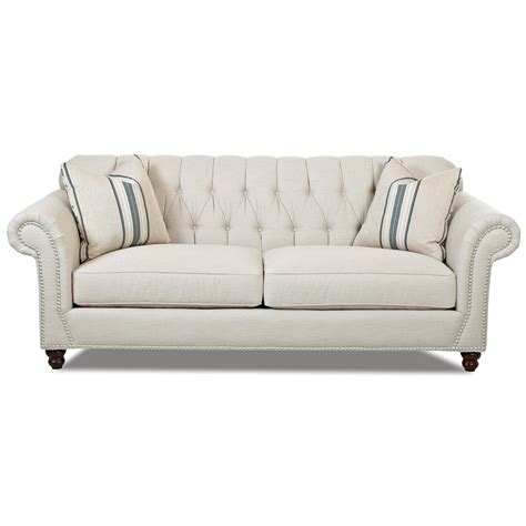 Traditional Sofa With Button Tufted Back Rolled Arms And Throw Pillows