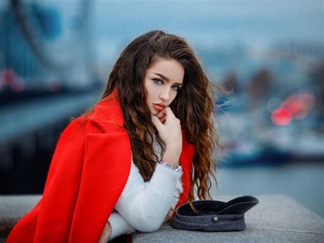 Download Attitude Girl Wearing A Large Red Coat Wallpaper Wallpapers Com