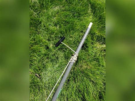 It can reach up to 16 feet! Fiskars limb trimmer - Adam Marshall Land & Auction, LLC