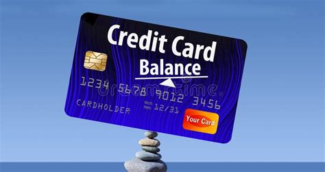 How is credit card interest calculated? The Idea Of Credit Card Balances Is Protrayed Here With A Card Balanced On Rocks On The Beach ...