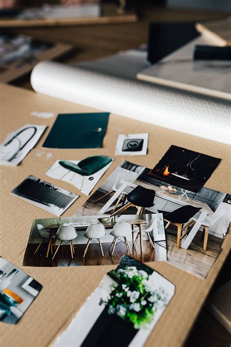 Royalty Free Photo Designers Working With Material Samples And Paper