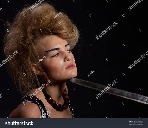 Young Warrior Woman Holding Sword Her Stock Photo 88388836 Shutterstock