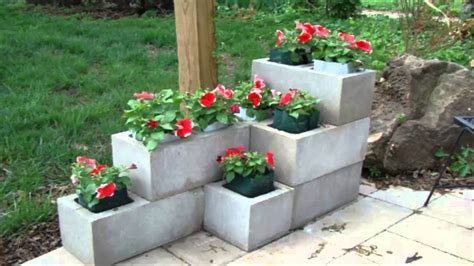 Cover the cinder blocks with wire mesh or landscape fabric to hold the potting soil and just pot your favorite plants but make sure to choose the right herbs to grow! How to Make DIY Landscaping Changes with Cinder Blocks
