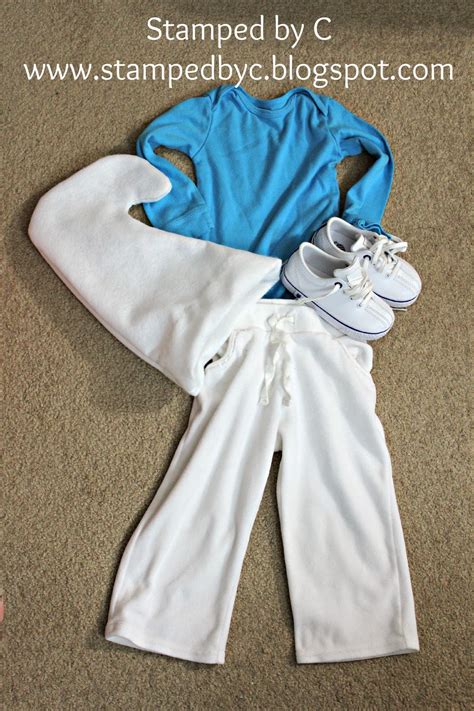 It will take you longer to paint yourself blue than it will to make this easy smurf costume! Stamped by C: DIY Smurfs Costume