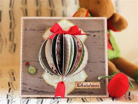 An electric guitar, bass guitar, acoustic guitar, bass drum, keyboard and an amplifier. How to Recycle: Recycled Christmas Card-Ball Ornaments