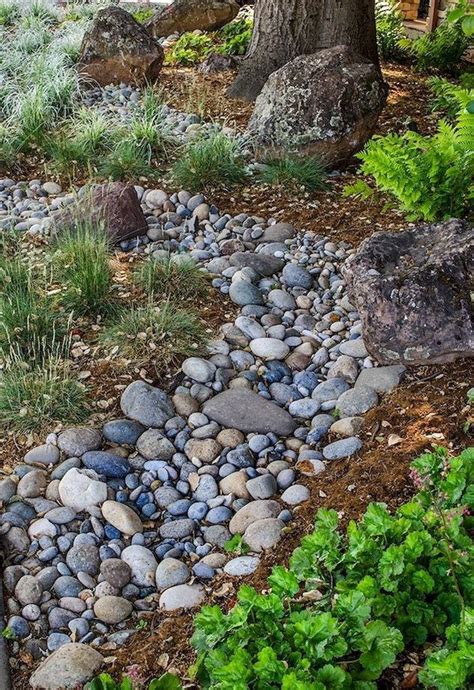 Lovely River Rocks Ideas For Front Yard Landscapes 26