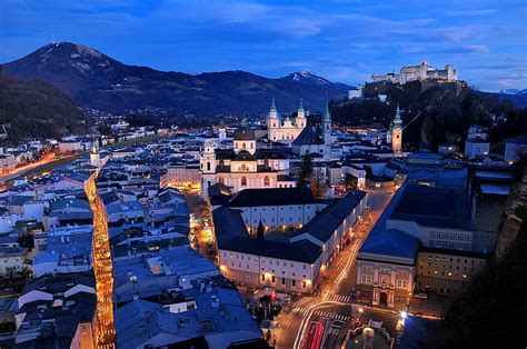 Historic City Of Salzburg With Salzach River In Winter During Blue Hour