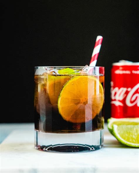 A rum and coke is a classic drink. THE Rum and Coke - A Couple Cooks