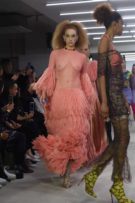 London Fashion Week Models Wear Daring Outfits As Fishnet And Sheer