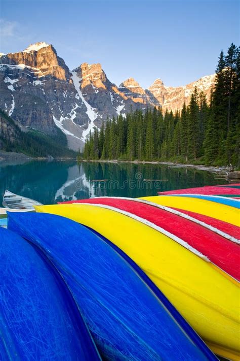 Colorful Canoes At Moraine Lake Banff National Park At Sunrise Stock