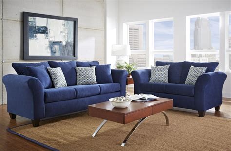 Foamy blues and earth tones provide an understated take on the traditional beach getaway in this living room decorating scheme, with novelty taking a backseat to comfort. Navy Blue Living Room Furniture6 | Ideas for the living ...