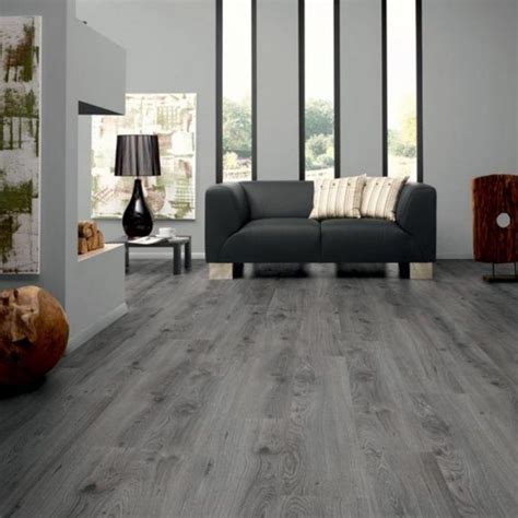 It creates a dramatic contrast with the wall that makes the room feel more elegant. Image result for bamboo floor for basement | Grey laminate ...
