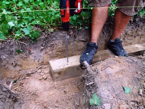I would first place an anchor at any 3 of the walls a, b, c, where. Building a Timber Retaining Wall | how-tos | DIY