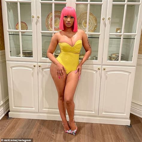 Nicki Minaj Puts Her Body Front And Center In Plunging Yellow Bodysuit