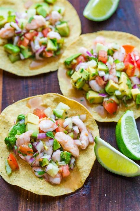 This refreshing tropical seafood ceviche is made with shrimp, mango, avocado, red onions, lime juice, orange juice, hot peppers (optional), cilantro, and salt. Ceviche Recipe - NatashasKitchen.com