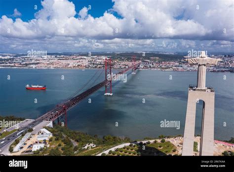 Drone soars, capturing the Christ the King statue and the iconic red