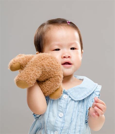 199 Baby Girl Holding Her Bear Doll Stock Photos Free And Royalty Free