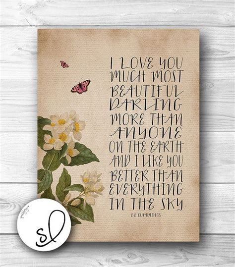 a card with the words i love you much and flowers on it next to a white