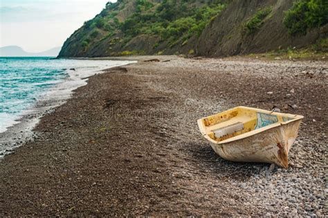 Lonely Boat On The Sunset Beach Stock Image Image Of Clouds Scenery