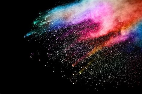 Premium Photo Abstract Colored Dust Explosion On A Black Background
