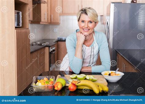 Woman Leaning Kitchen Counter Stock Image Image Of Aged Home 64155265