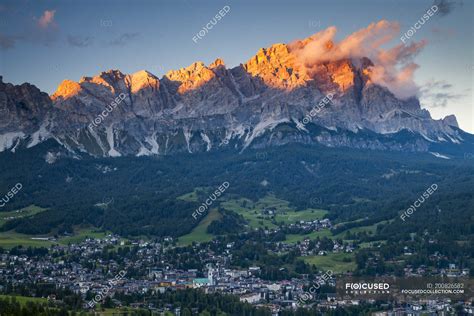 Sunset Over Resort Town Of Cortina Dampezzo In Dolomites In Northern