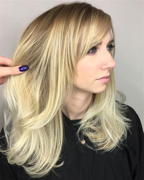 Medium length hairstyles are getting more and more popular among women who want to look stylish and trending. 40 Cute and Effortless Long Layered Haircuts with Bangs