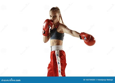 Young Female Kickboxing Fighter Training Isolated On White Background