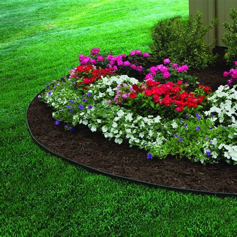 Landscape edging gives your lawn a finished and tidy look. EasyFlex 2-inch Tall Wall No-Dig Edging in Black, 30 ft ...