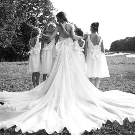 we are loving this amazing picture of our realbride chiara and her pretty flower girls dress