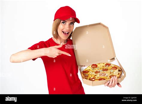 Pizza Delivery Girl Pointing Finger To Pizza On White Background Stock