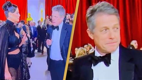 Hugh Grant Criticized For Incredibly Awkward And Rude Oscars Red