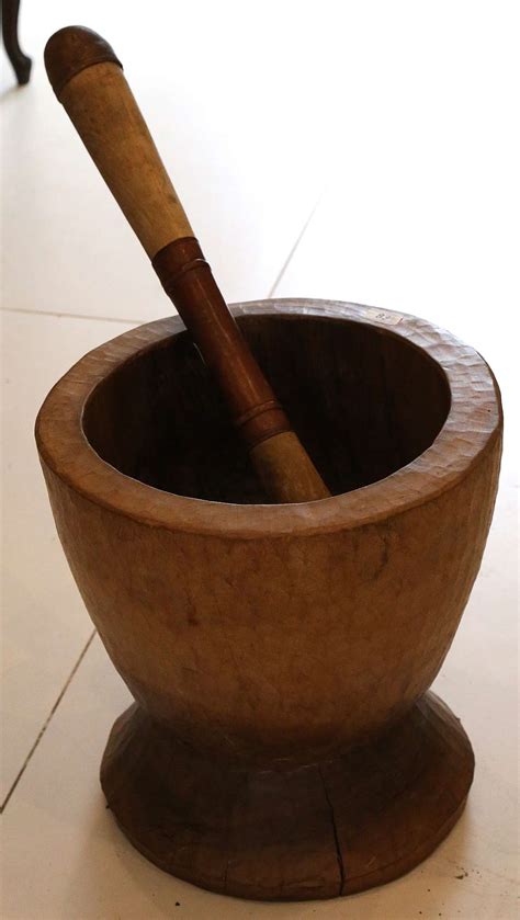 A Large African Wooden Pestle And Mortar 40cm High Length Of Pestle