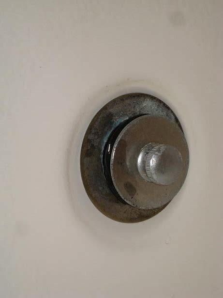 Remove the faceplate of a trip lever drain. How do I remove pop-up shower drain?